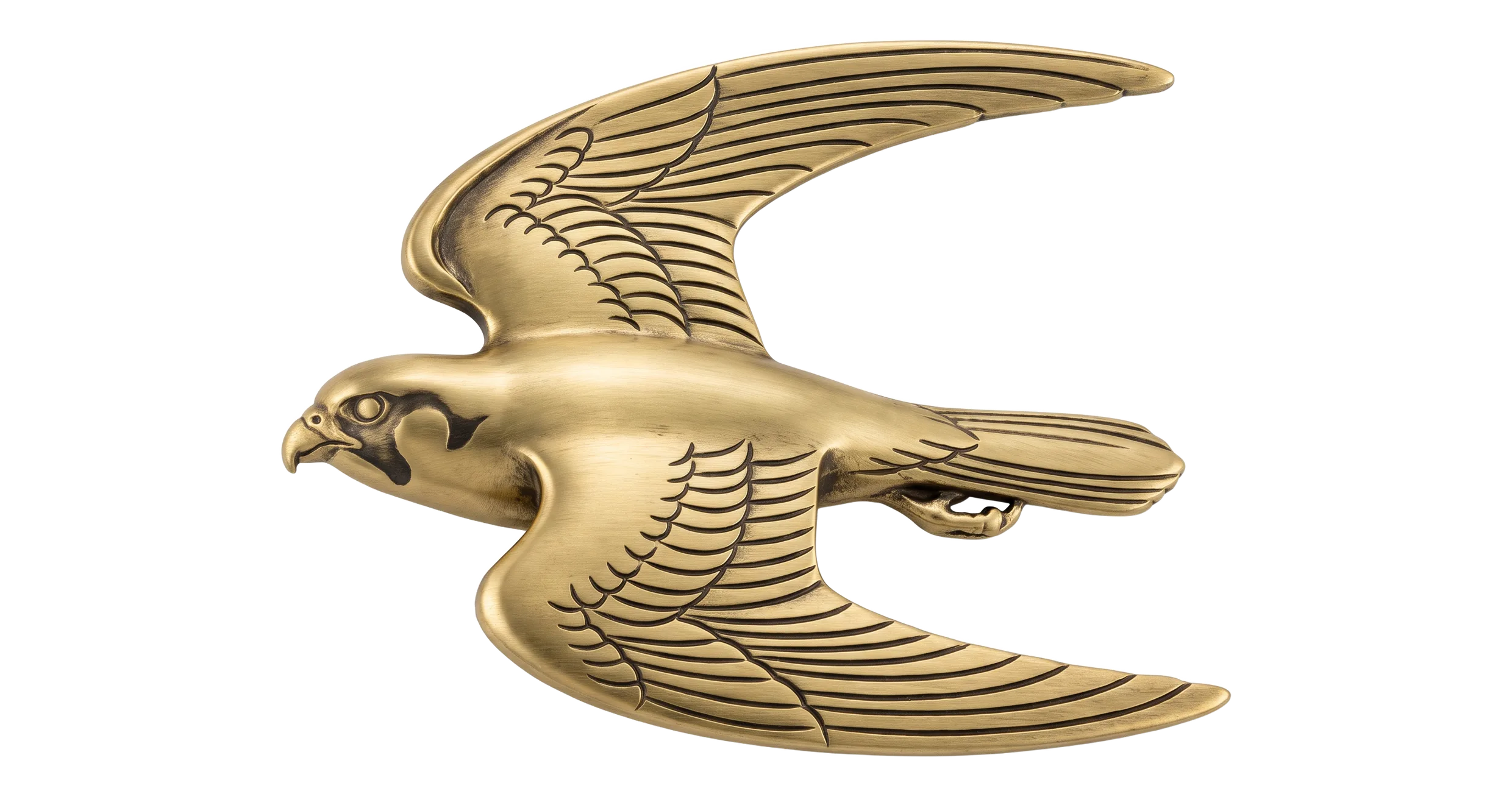 A sculpted antique-gold falcon with wings spread